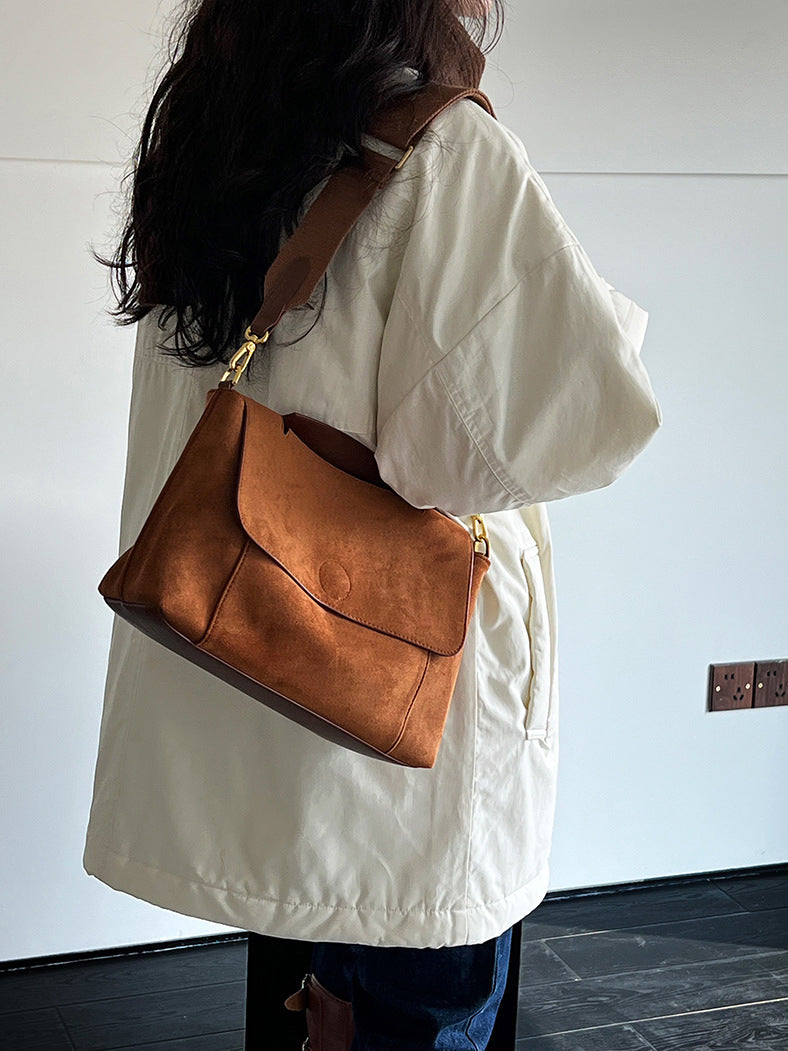 ミニマルデザイン中綿コ一ト